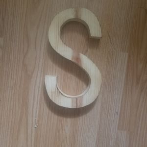 A wooden "S" wall decor
